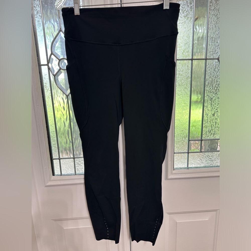 Lululemon Fast and Free High-Rise Tight 25" with Pockets in Black size 10